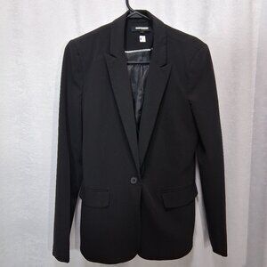 3. Attitude Jay Manuel Black Blazer in a size 6.